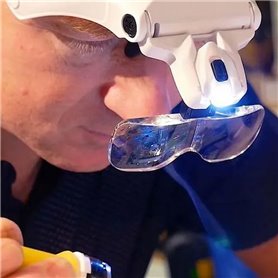 Headlamp with magnifying glass